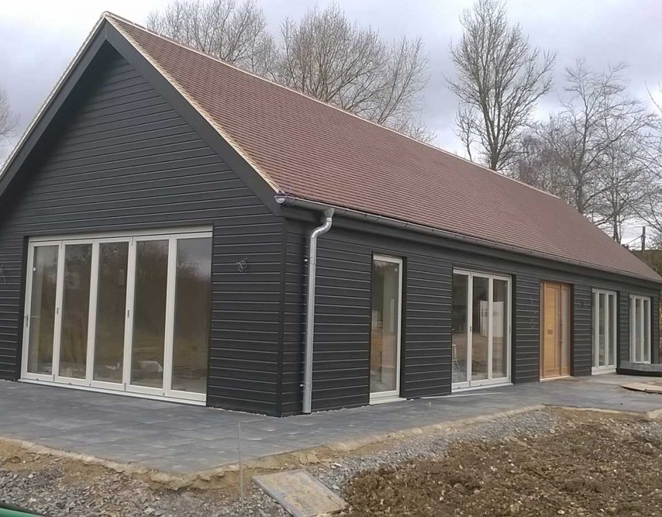 Large cladded barn conversion into living accommodation