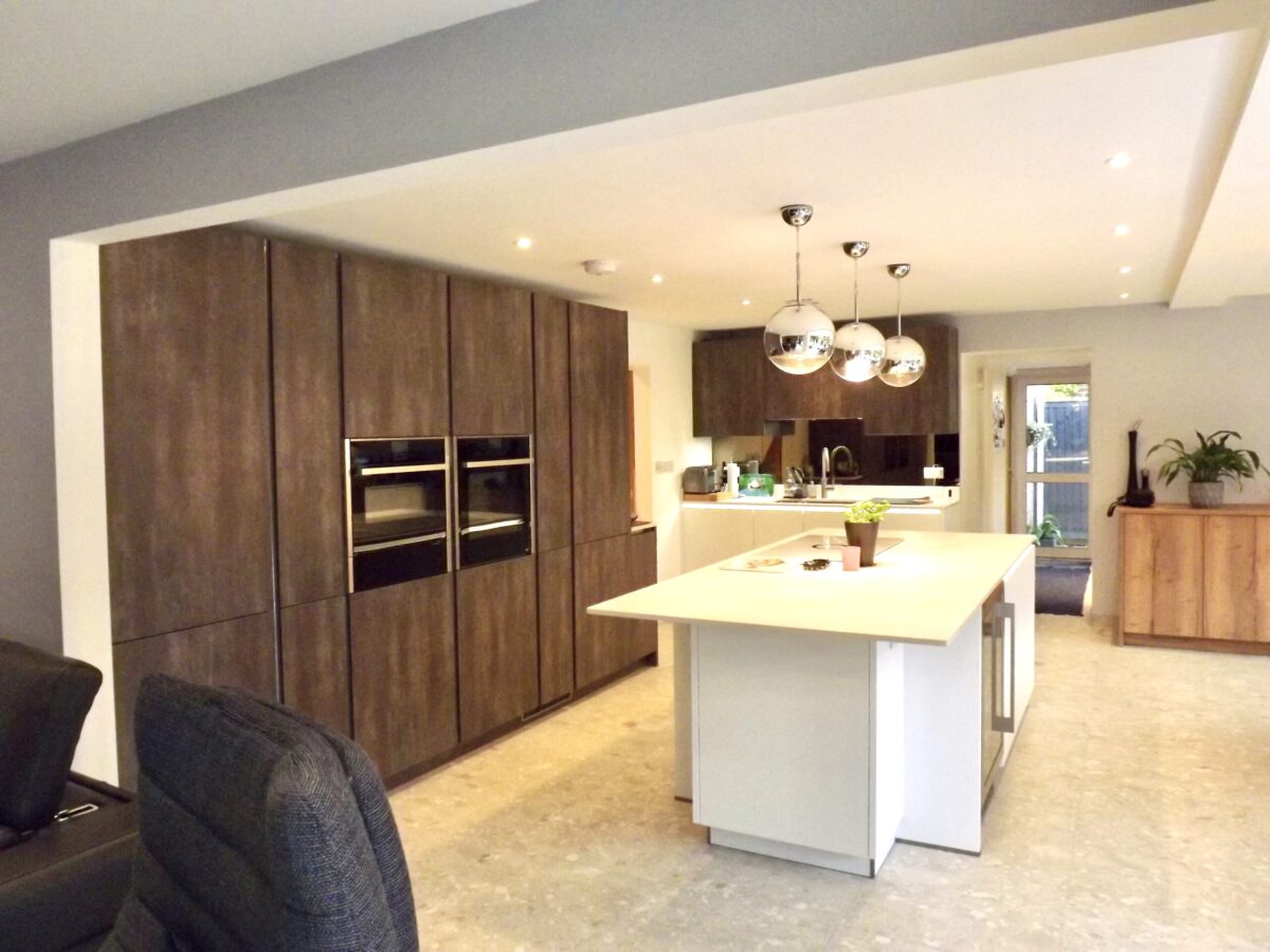 Kitchen island and floor to ceiling cupboards