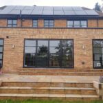 Rear extension with large black bifold doors.